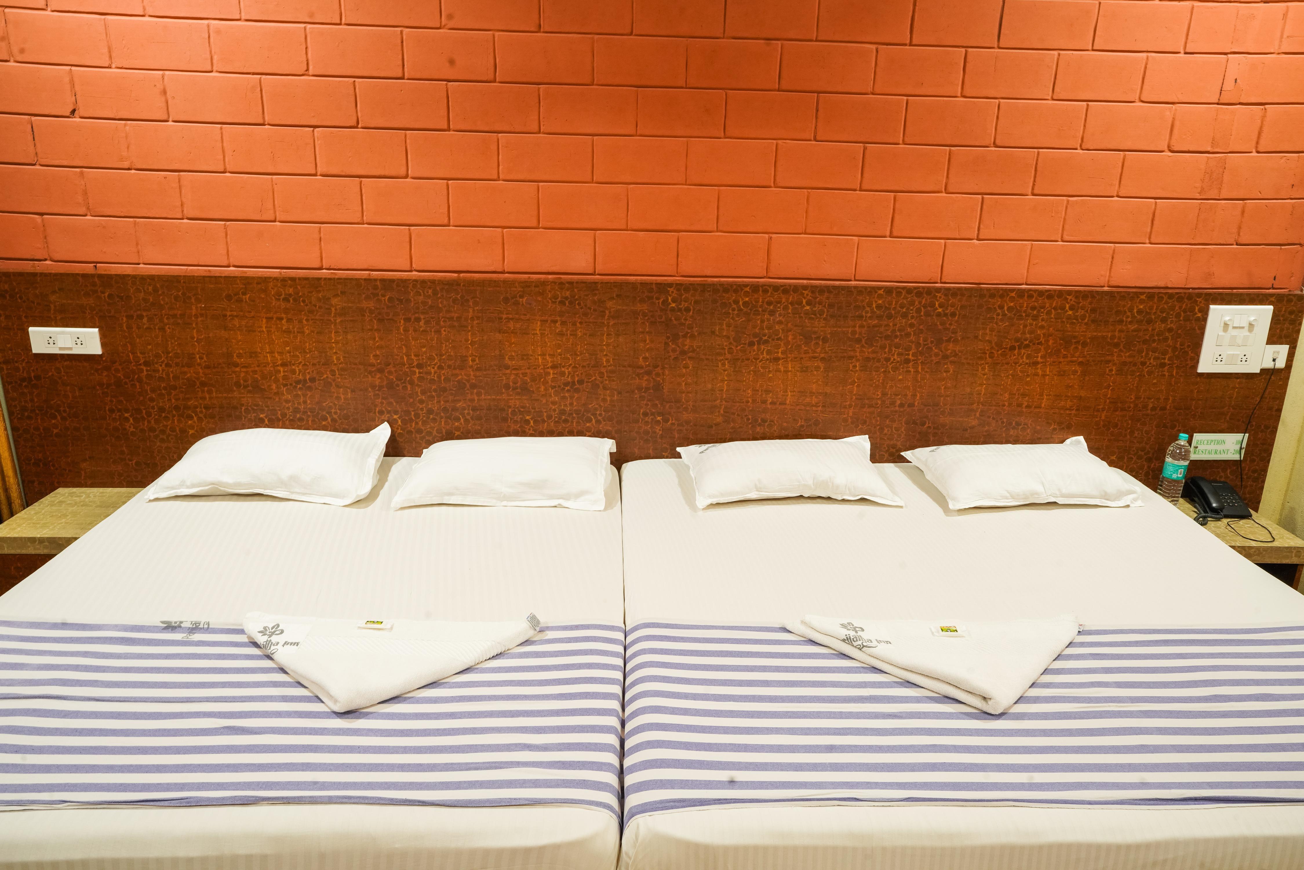 Hotel Parijatha Inn - Tap to explore photos