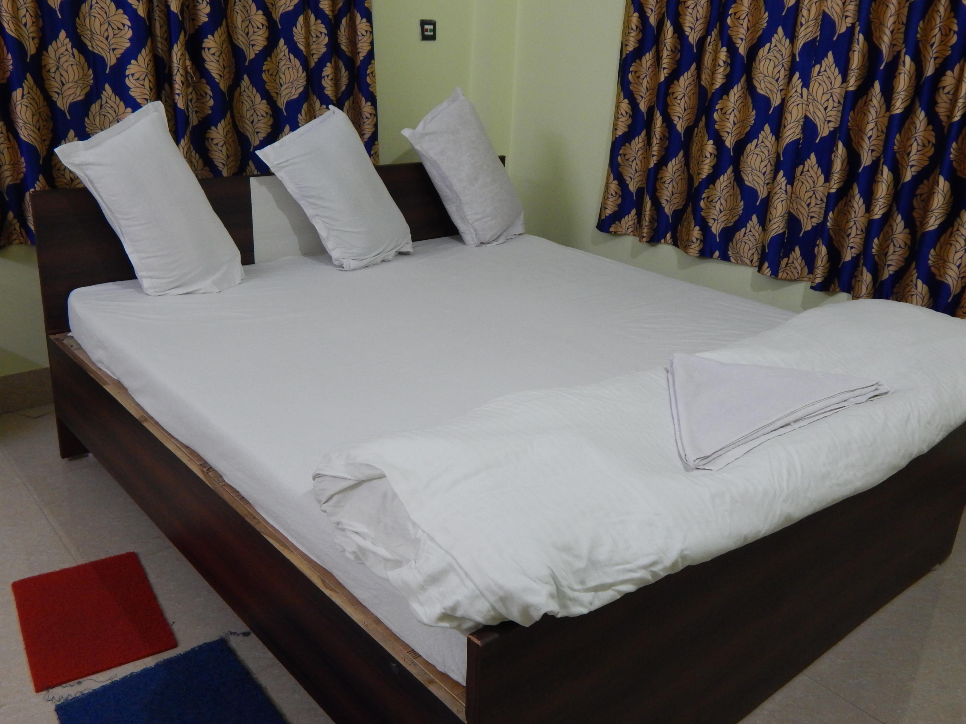Atithya Guest House Room Type - CLASSIC TRIPLE BED ROOM