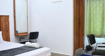 The Nest Guest House Room Type - DELUXE ROOM