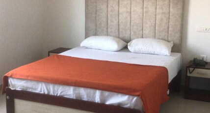 Sithara Tower Room Type - AC Deluxe Room with Smart TV