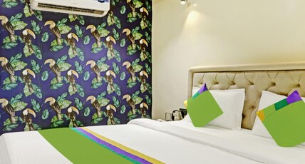 Treebo Risha Room Type - Deluxe Room