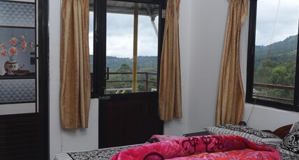 Sri Lakshmi Home Stay Room Type - Queen Room with Garden View