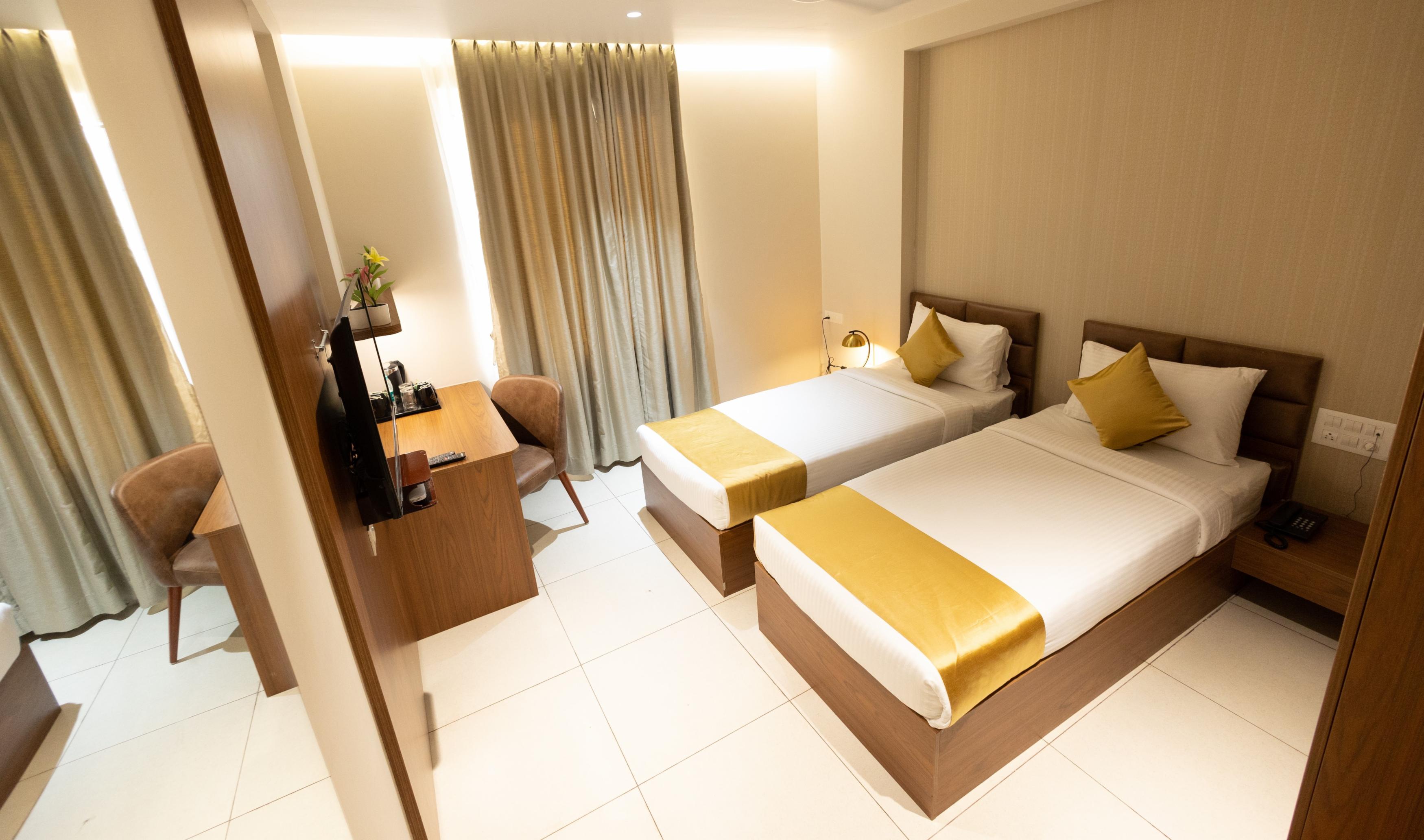 Poornima Regency Room Type - Deluxe Twin