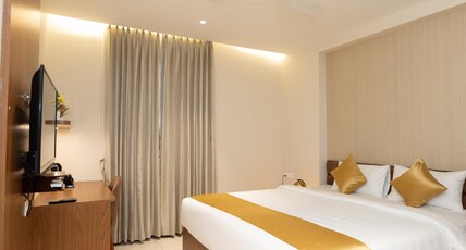 Poornima Regency Room Type - Deluxe Room