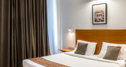 Enkay Residency | 32nd Avenue Room Type - Superior King Room