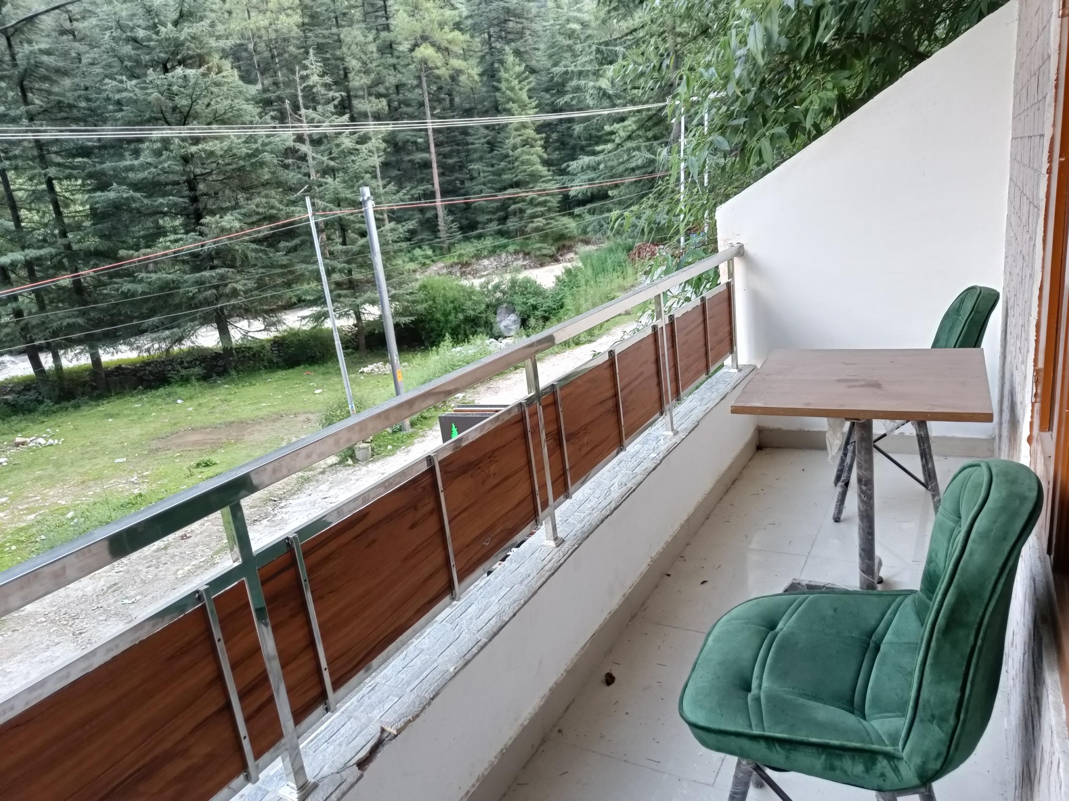 Pinewood Inn Kasol - Tap to explore photos