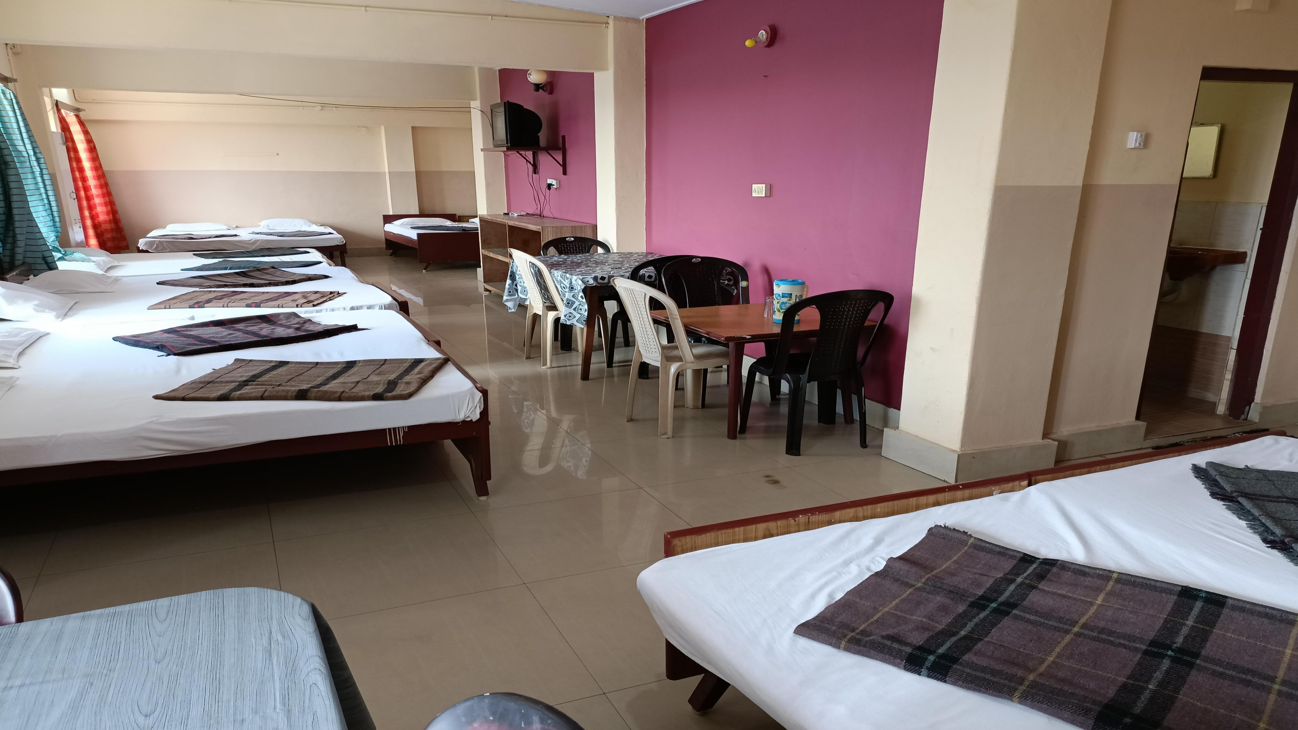 Sri Lakshmi Tourist Home - Tap to explore photos