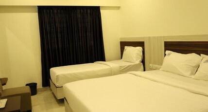 Hotel Sigma Suites Room Type - Triple Room Non Ac