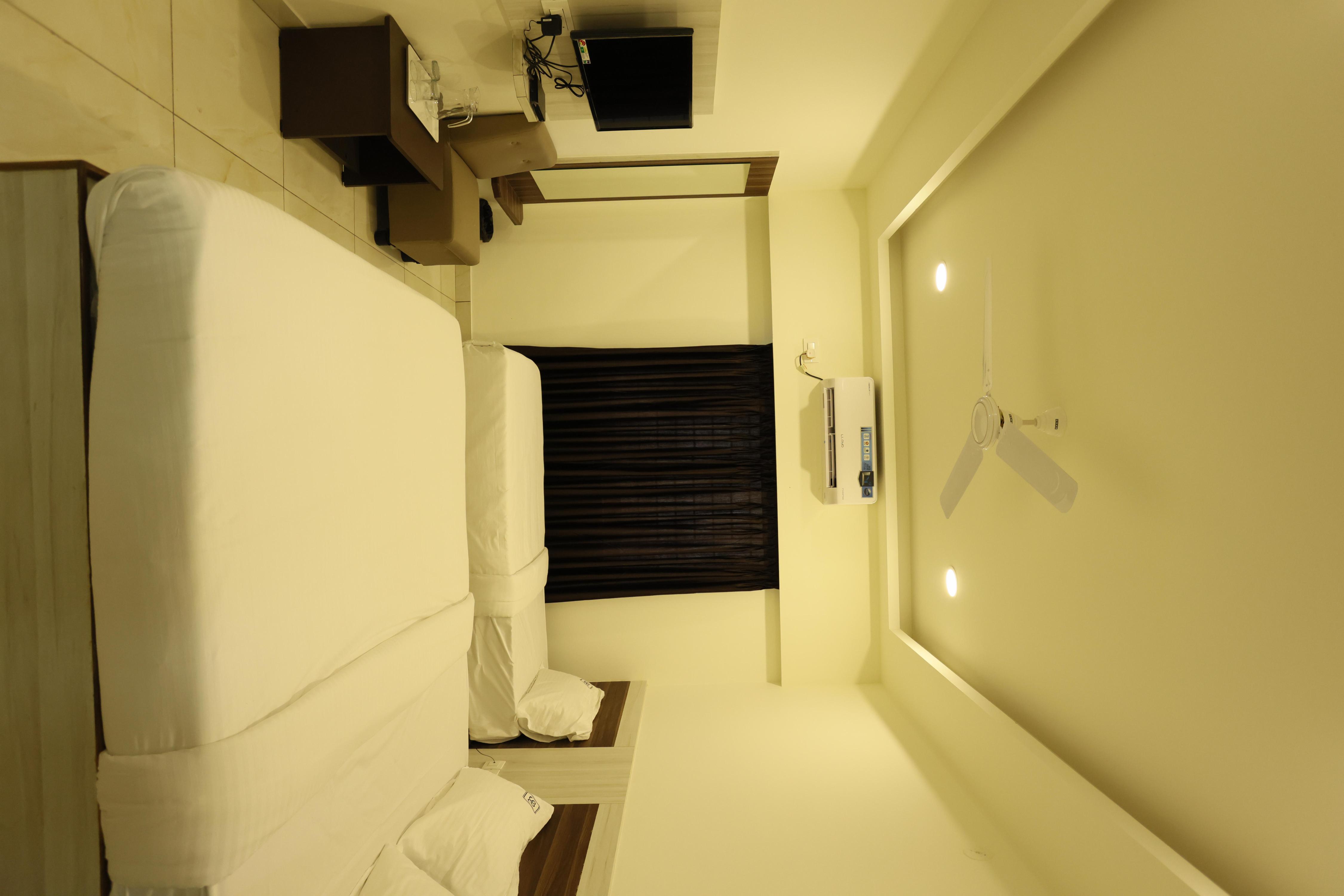 Hotel Sigma Suites - Tap to explore photos