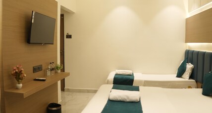 Kiara Eshosans Palace (100 meters From Sai Samadhi Temple) Room Type - Luxury Triple Bed Room Kiara Eshosans Palace (100 meters From Sai Samadhi Temple) Room Type - Luxury Triple Bed Room