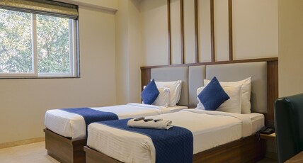 MAGNUS FORTUNE HOUSE, MAGARPATTA Room Type - Premium Twin Bed Room