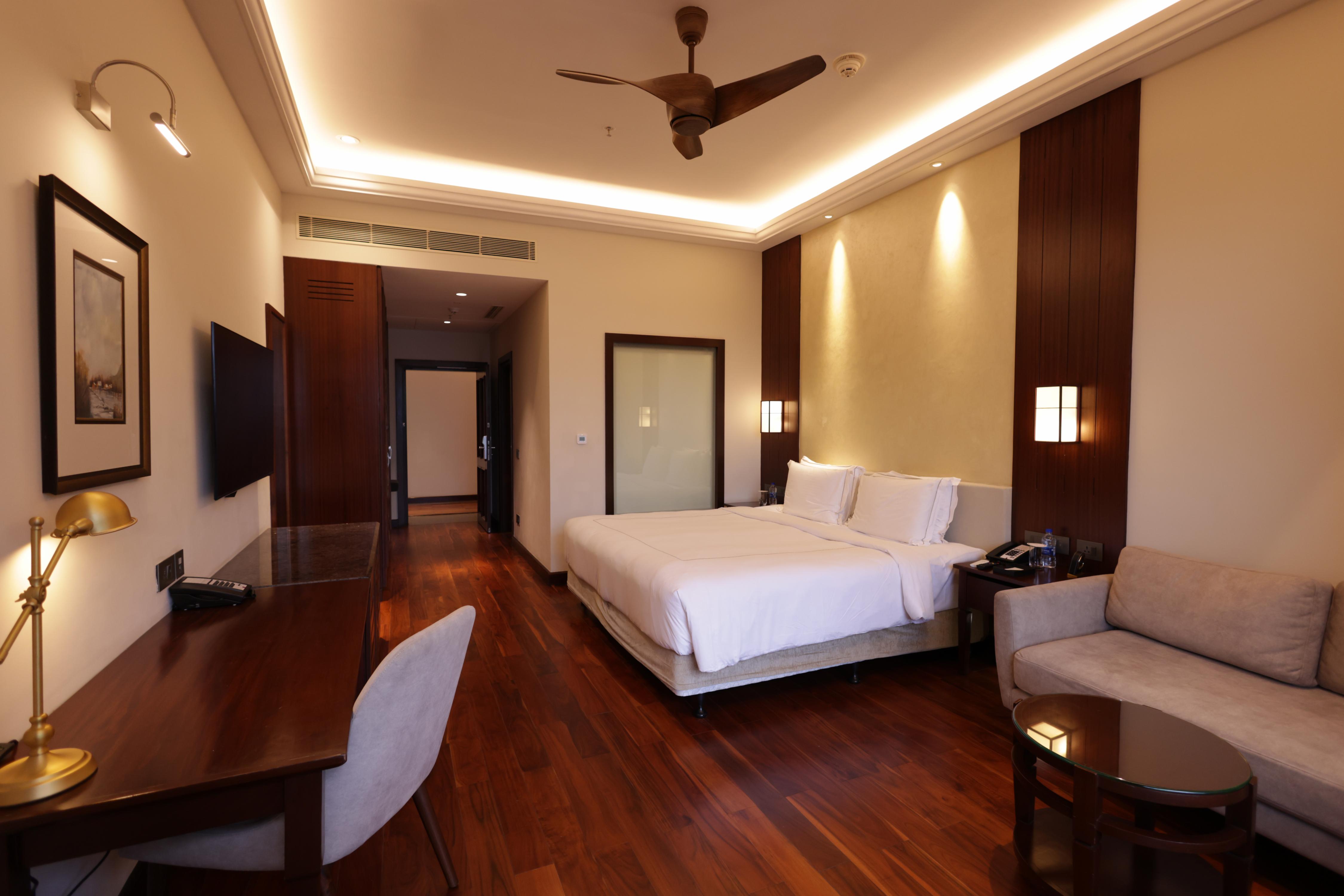 Taj Wayanad Resort & Spa, Kerala Room Type - Luxury Room Lake View Balcony King Bed