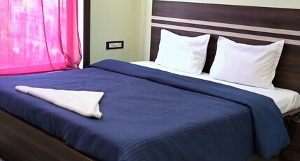 AVA  Guest  House Room Type - Deluxe AC