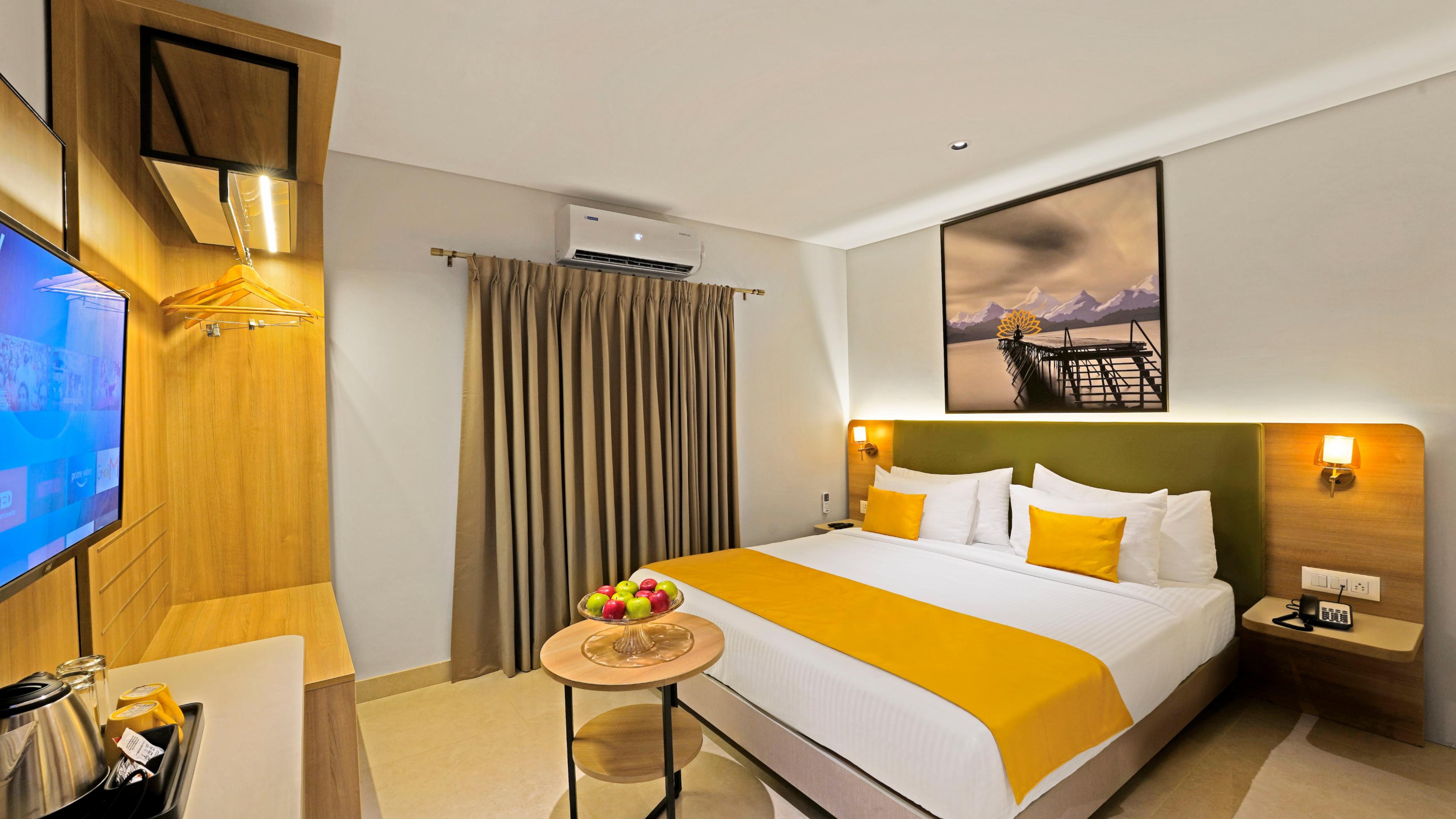 Click Hotel Biz, Bangalore Airport - Tap to explore photos