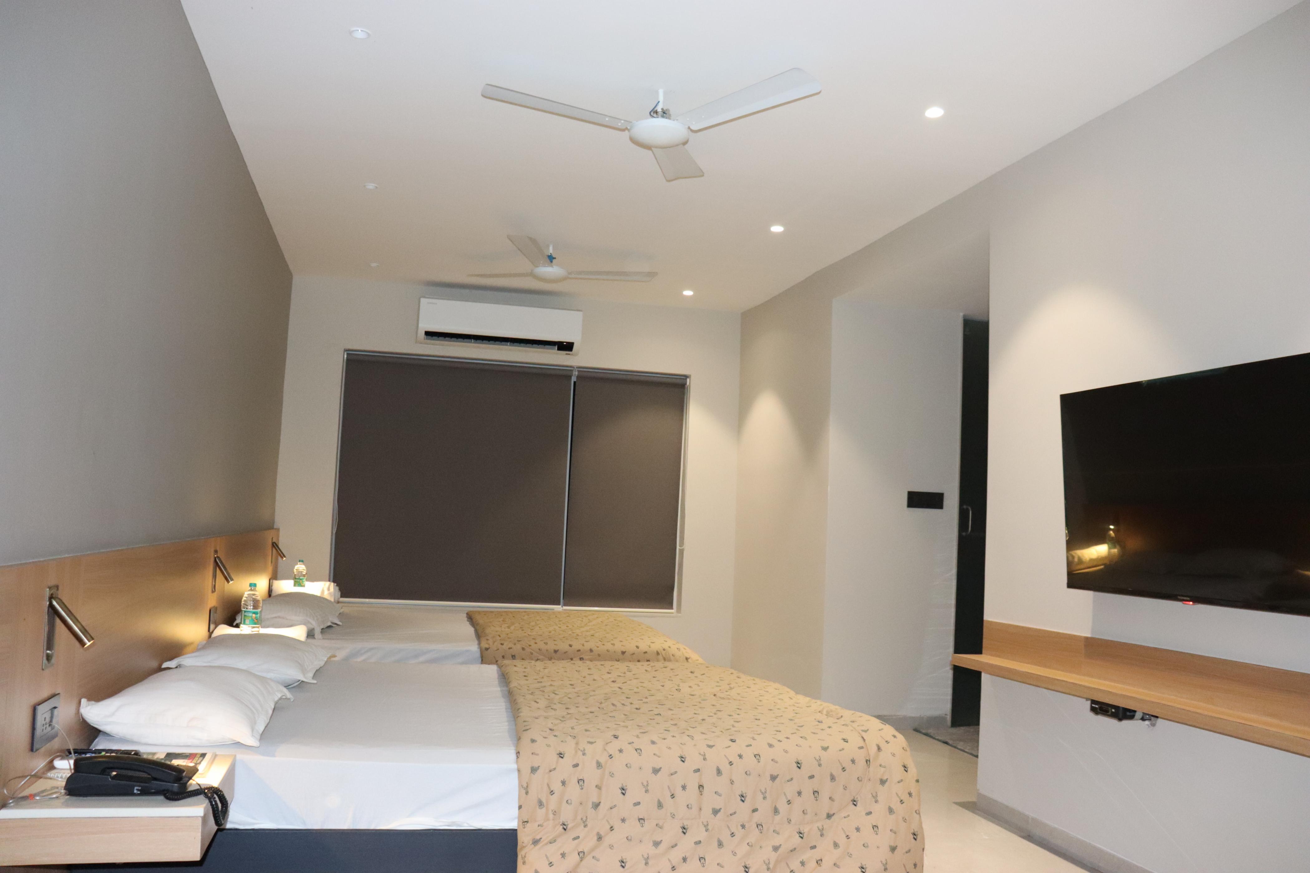 Hotel Soham - Tap to explore photos