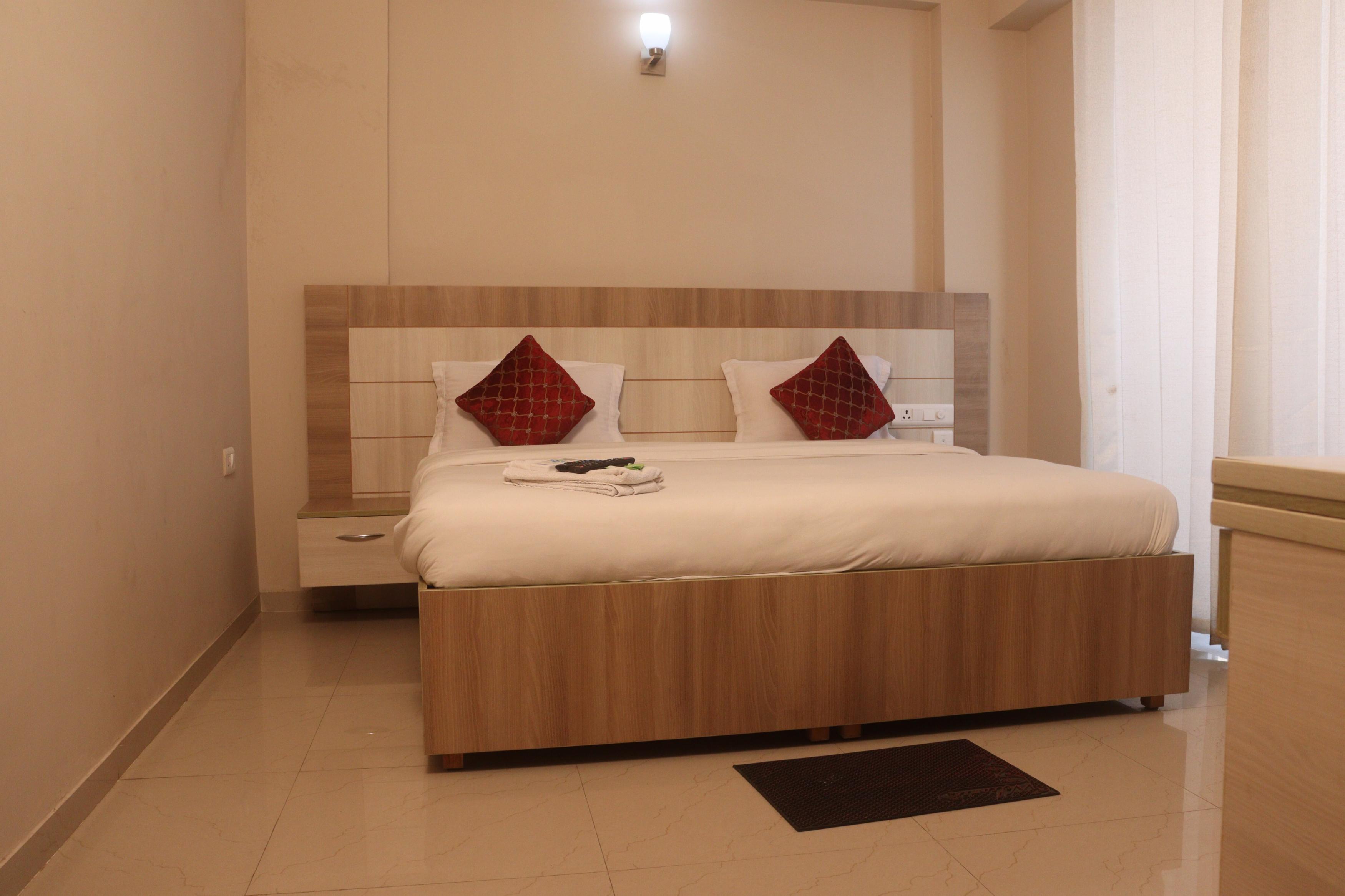 Sridham Holiday Vrindavan | Studio Rooms with AC & Free Wifi - Tap to explore photos