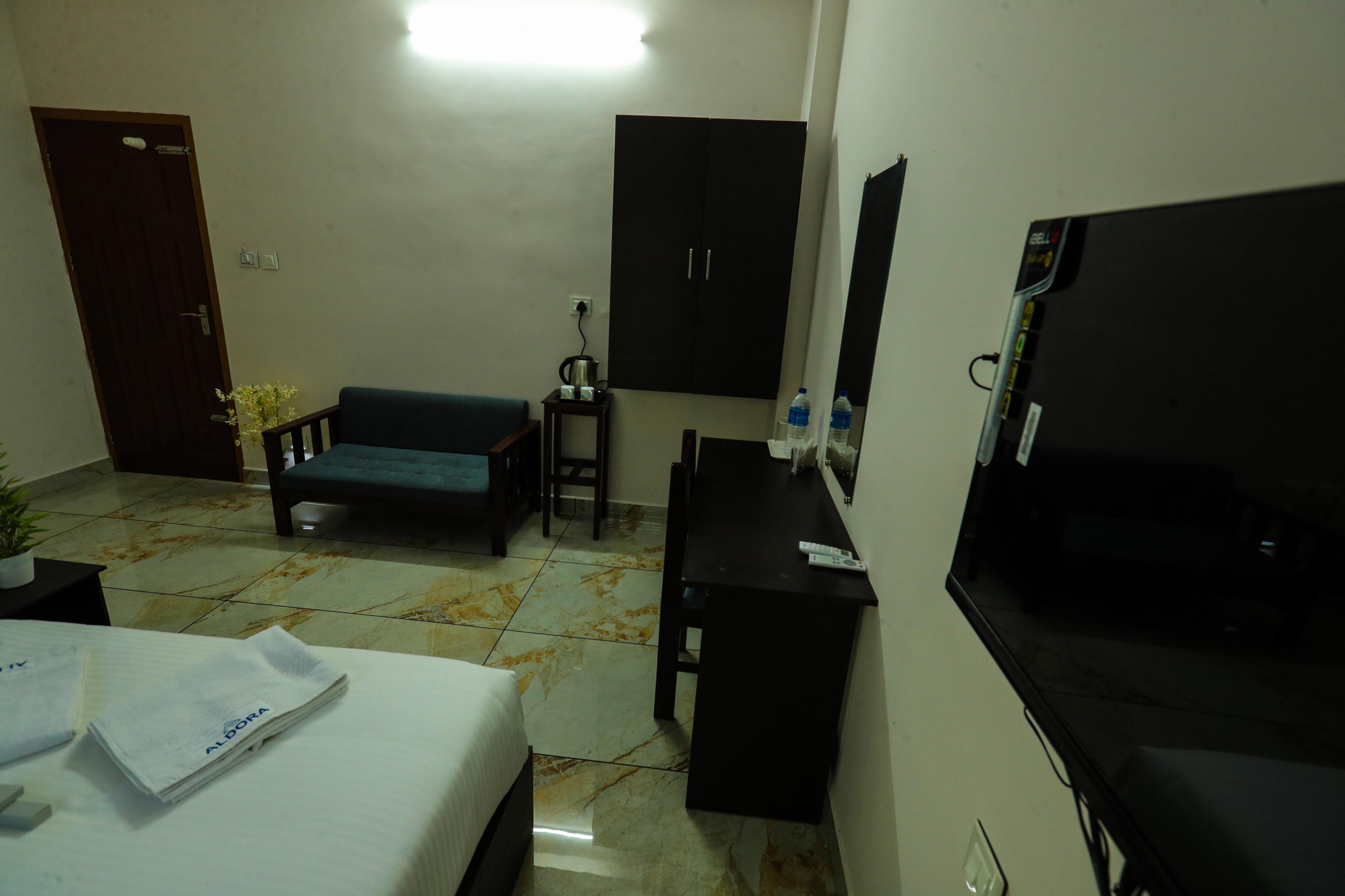 Aldora Airport Residency - Tap to explore photos