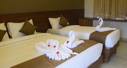 PVK RESIDENCY Room Type - 3 Bedded AC Family Room