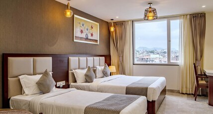THE MANGAL VIEW RESIDENCY- A Luxury Business Hotel Room Type - Triple Room with City View