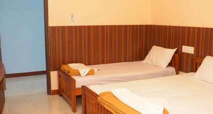 M S Residency Palani Room Type - Deluxe three bed room non-AC