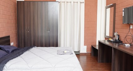 Tea Leaf Stays by Brown Tree Resorts Room Type - Deluxe Double Room