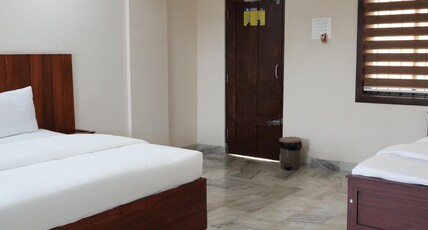 kalanad residency and convention centre Room Type - Deluxe Triple Bed AC (3 Adults)