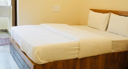 kalanad residency and convention centre Room Type - Standard AC