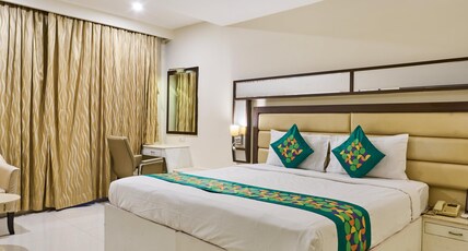 Treebo Premium Metropolis Room Type - Deluxe Room