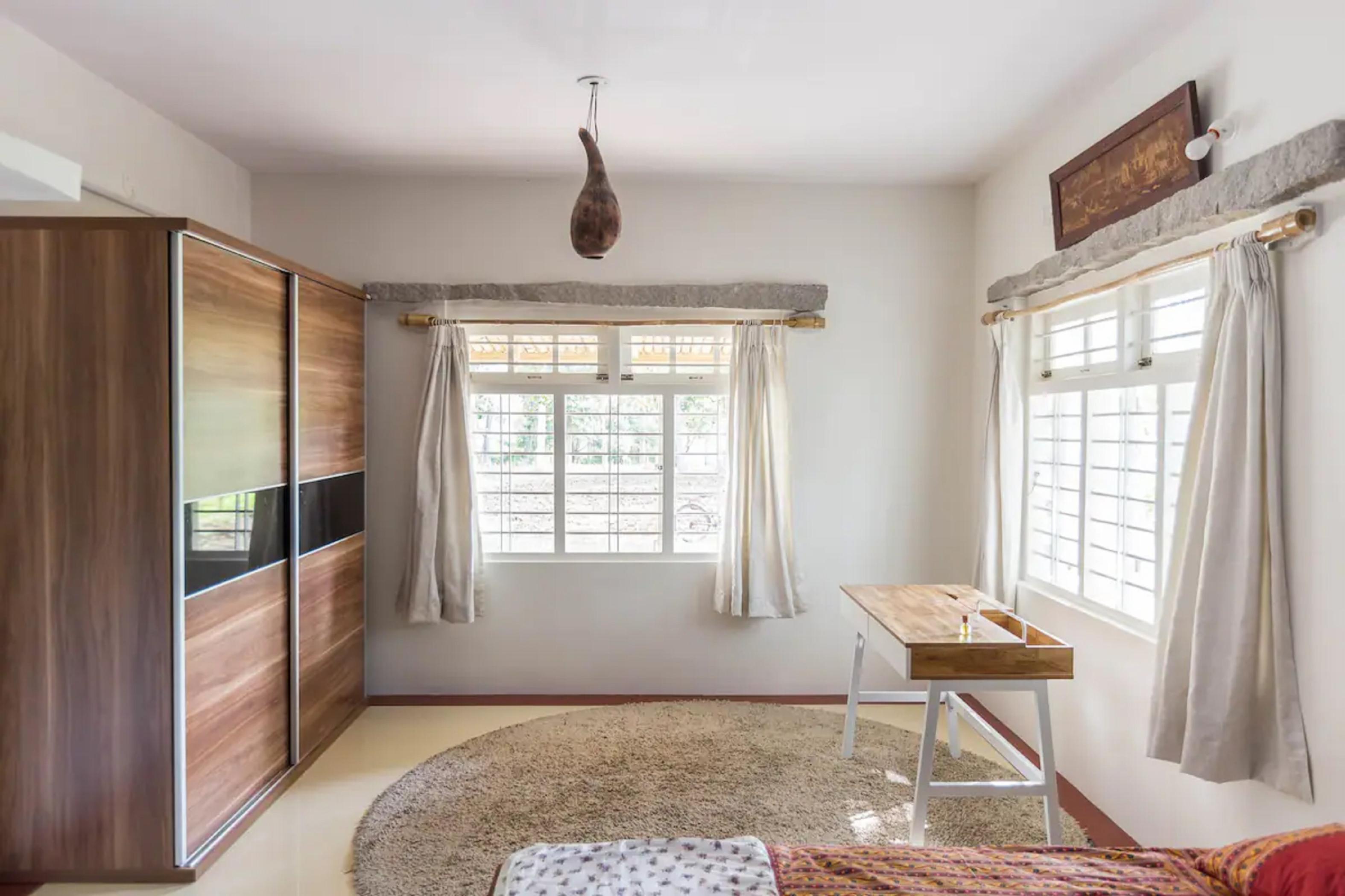 Prakruti Farms l Flameback Room Type - Bedroom