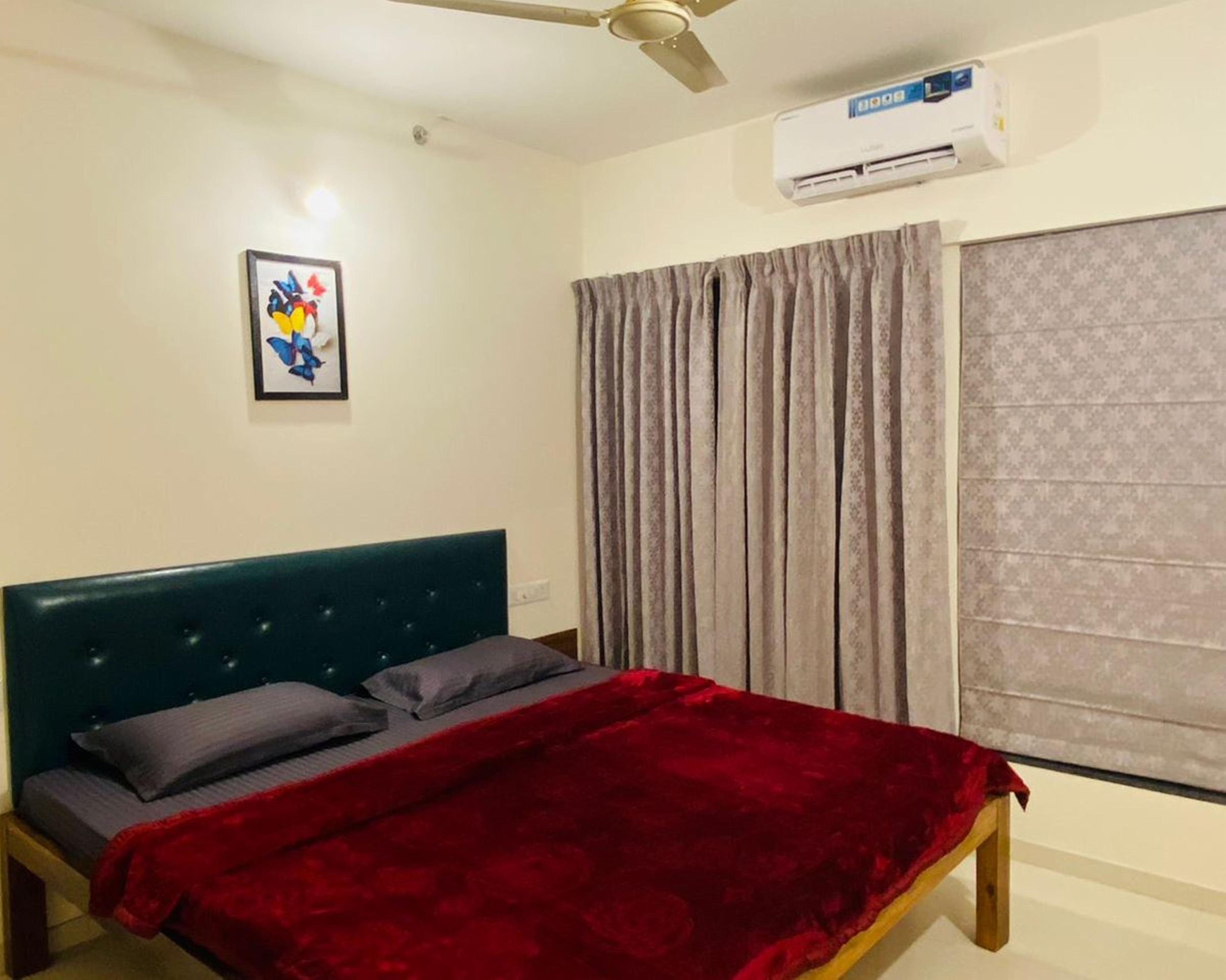 Humming Bird Service Apartment - Tap to explore photos