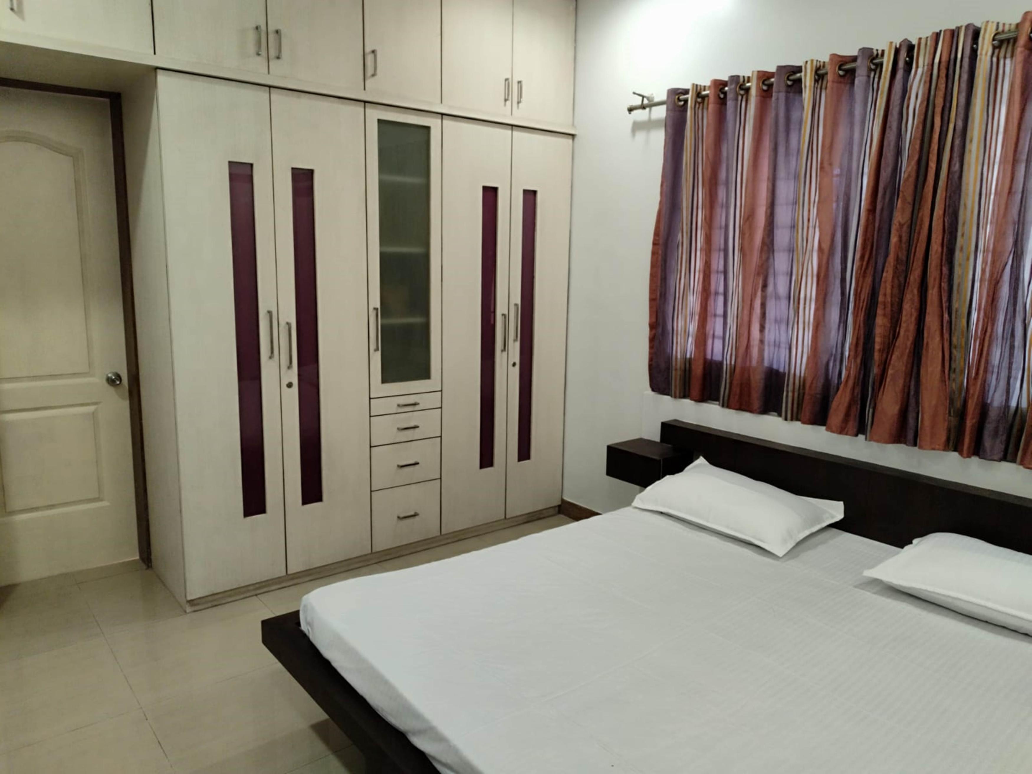 Classy 2 BHK Serviced Appt - Tap to explore photos