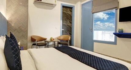 Hotel Elite 29 Golf Course Road Gurgaon Room Type - Deluxe Room with Balcony