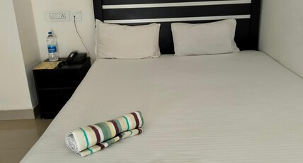 Surya kiran Inn Room Type - Deluxe (best for double occupancy)