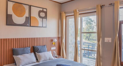 The Trippy Tribe Extended Bir Room Type - Deluxe private room with private balcony