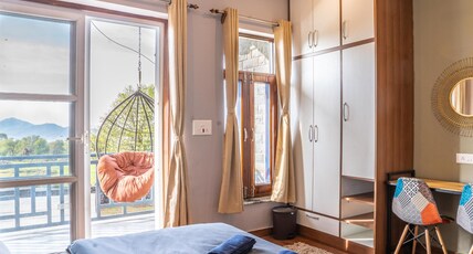 The Trippy Tribe Extended Bir Room Type - Deluxe private room with private balcony