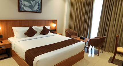 Saffron Wayanad Room Type - Deluxe AC with Balcony