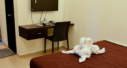 MALVANS AISHWARYA Room Type - Standard Twin Room