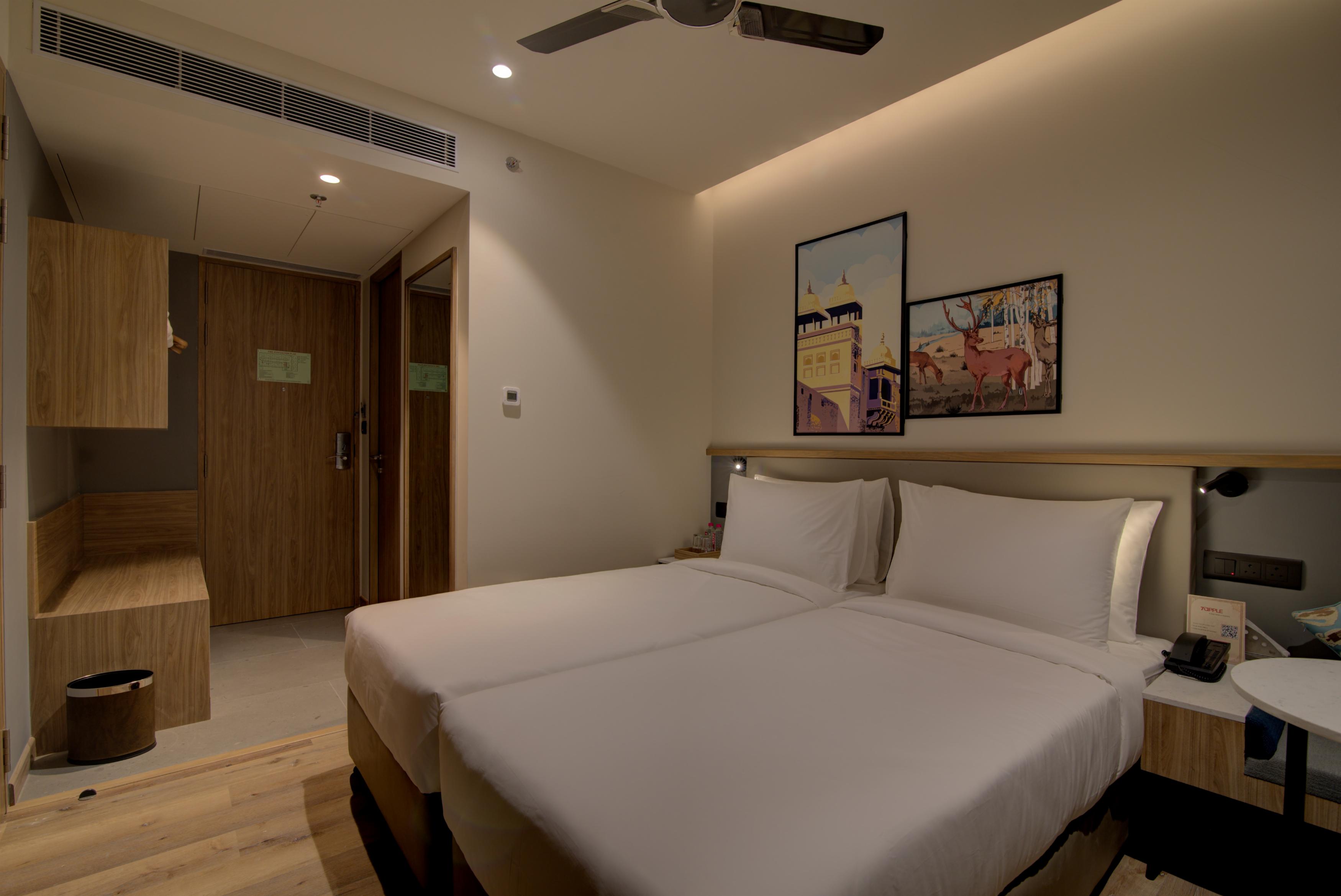 7 Apple Hotel Pratap Nagar - Tap to explore photos