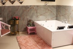 Modern Jacuzzi Spa Tub 1BHK Suite South Delhi 3