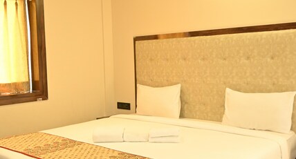 HOTEL A ONE LUXURY Room Type - Parivaar  Room( Triple Sharing Room with Window Sea View)