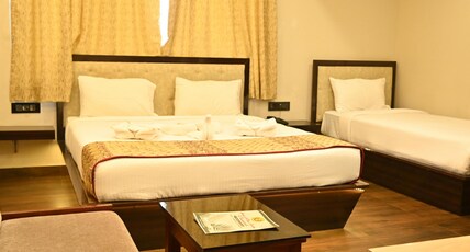 HOTEL A ONE LUXURY Room Type - Chhota Parivar Room( Deluxe Room)