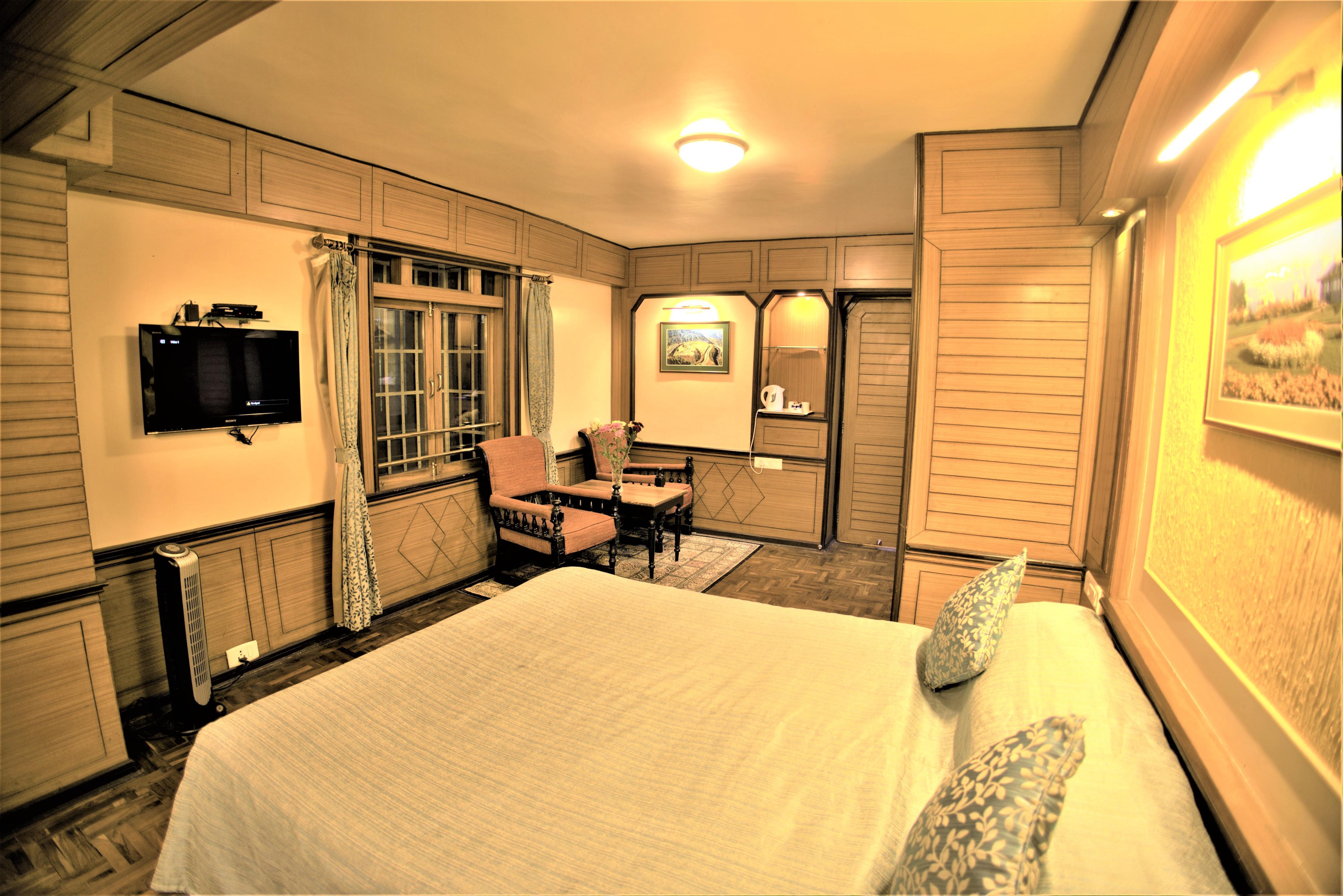 Hotel Lunnar (Pure Veg) Room Type - Deluxe Room (Non View )