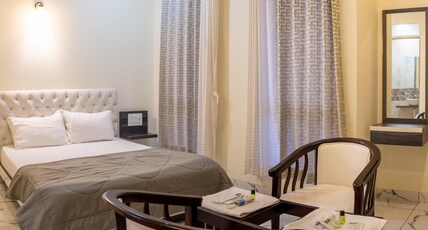 The Padival Grand- A unit of Mahaveer Ventures Room Type - DOUBLE BED AC ROOM