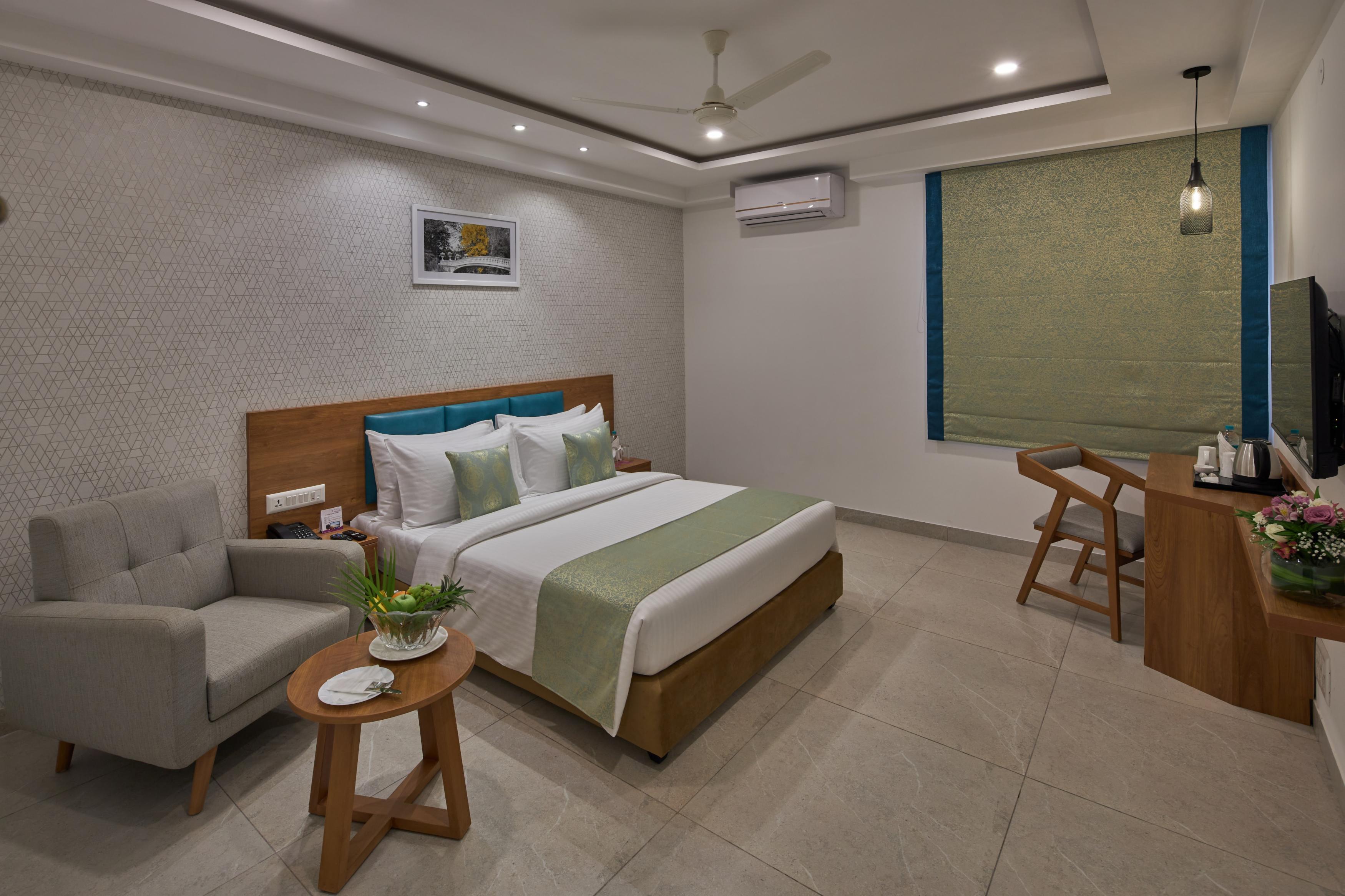 Regenta Inn 4th Block Koramangala Bangalore - Tap to explore photos