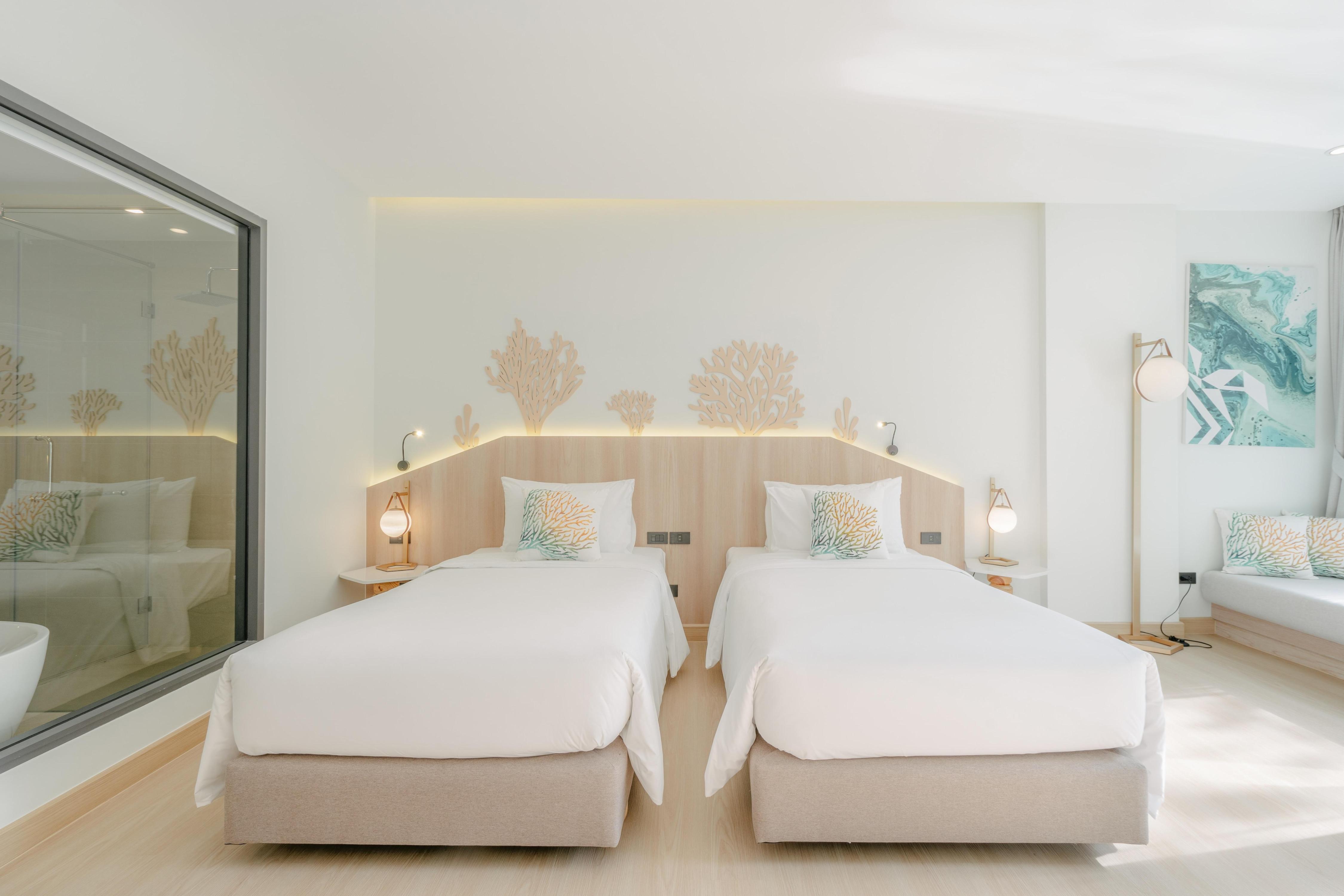 Phuket Emerald Beach Resort - Tap to explore photos