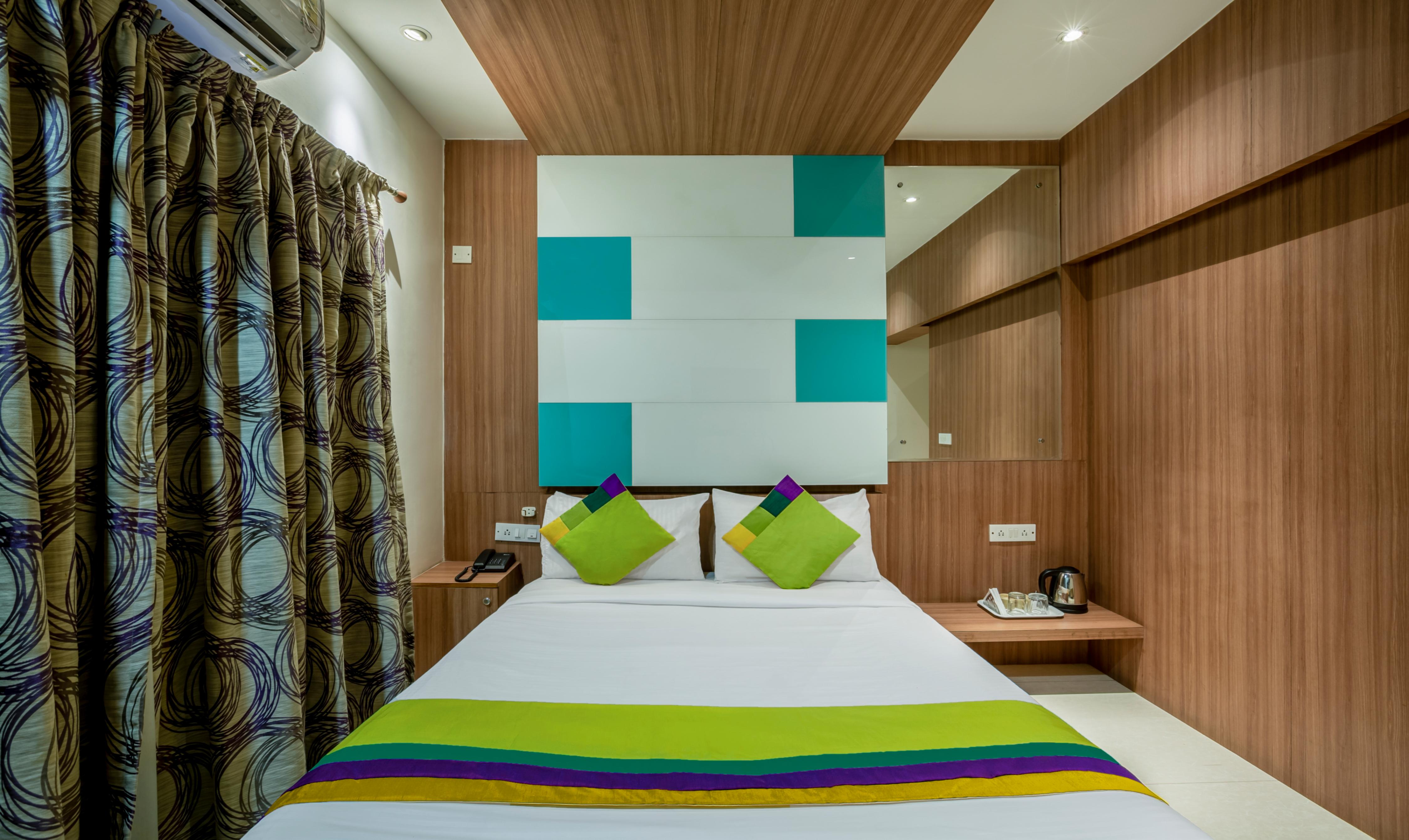 Treebo Hiland Suites - Tap to explore photos