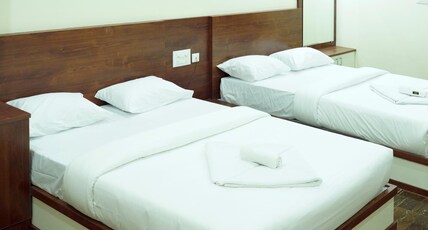 HOTEL NIVETHA INN Room Type - DELUXE FOUR BED