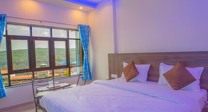 VEGGIES RESIDENCY AND PURE VEG RESTAURANT Room Type - KING SUIT