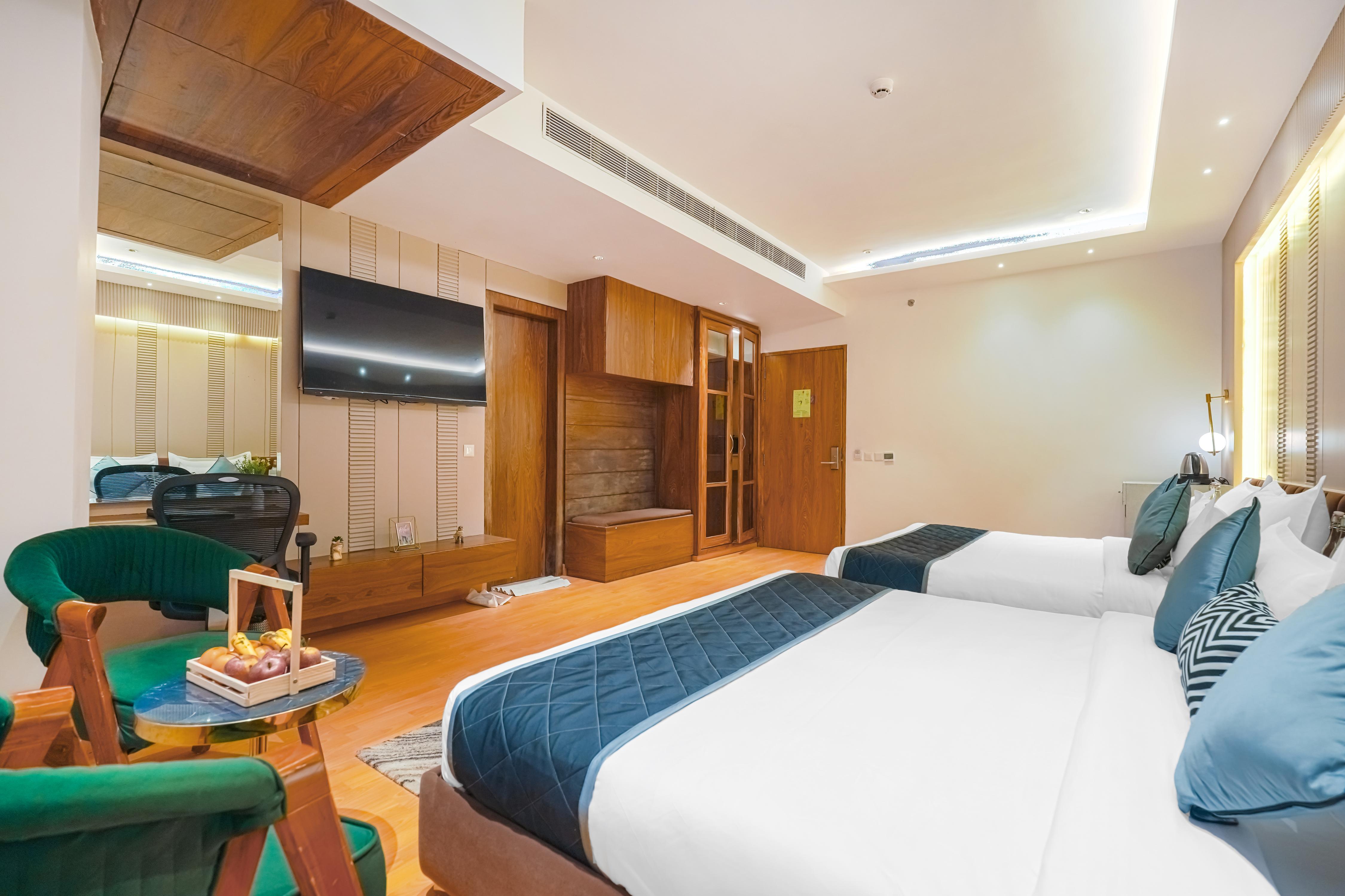 Quality Inn Elite By White Panda Hotels - Tap to explore photos
