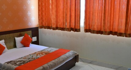Hotel Subham Residency and Restaurant Room Type - Deluxe Room